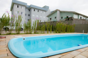 Отель Apartamento Erica Itaguá proximo da Praia Grande  Убатуба
